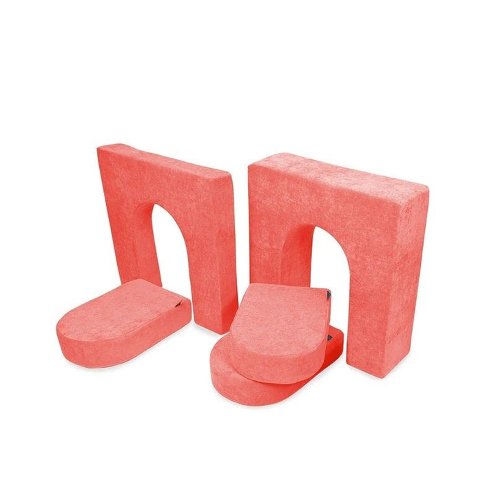 Go Coconut Walls and Doors Bundle in Coral Crush showing the 5-piece modular foam set with two wall thicknesses and three doors for building enclosed play spaces and forts with The Coconut play couch