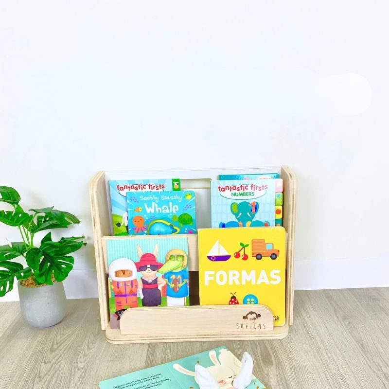 Sapiens Child Guava Montessori Bookshelf landscape view in an indoor home setting showing the compact 19.8 inch wide forward-facing toddler bookshelf with eco-friendly non-toxic wood finish