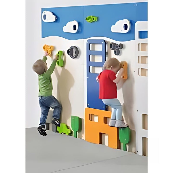 Two toddlers using the HABA Pro City Wall Panels side by side, showing the low-height birch wood city applications and safety zone base that supports children under 3