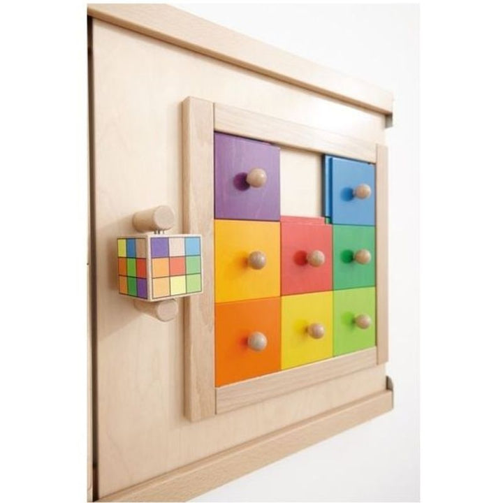 Side profile view of the HABA Pro Colorful Squares sensory wall panel showing birch veneer construction and panel depth
