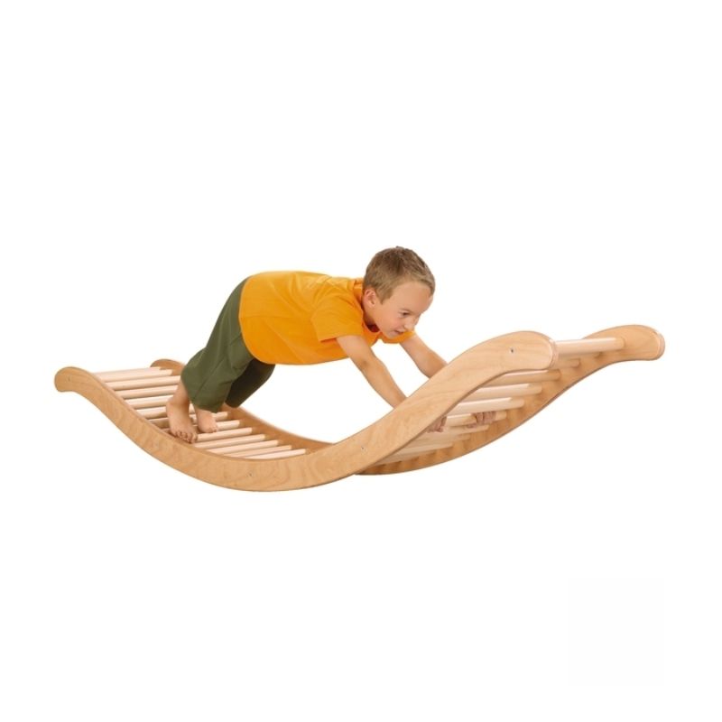 HABA Pro See-Saw Balancing Ladder with child crawling through the wooden rungs in active gross motor play