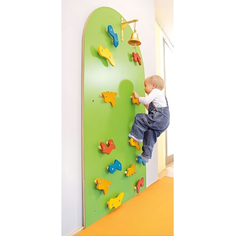 HABA Pro Toddler Climbing Wall showing a child actively climbing the indoor wall-mounted climber with pre-assembled holds for gross motor development