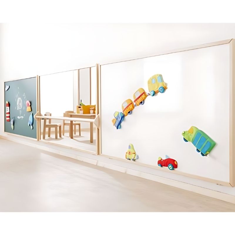 HABA Pro Whiteboard Wall Panel mounted in a classroom showing the full landscape orientation and birch wood frame
