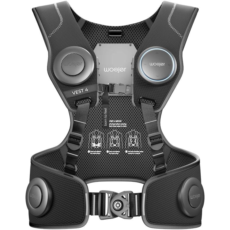 Woojer Vest 4 haptic vest laid flat with its chest straps, waist belt and six vibroacoustic haptic zones in view