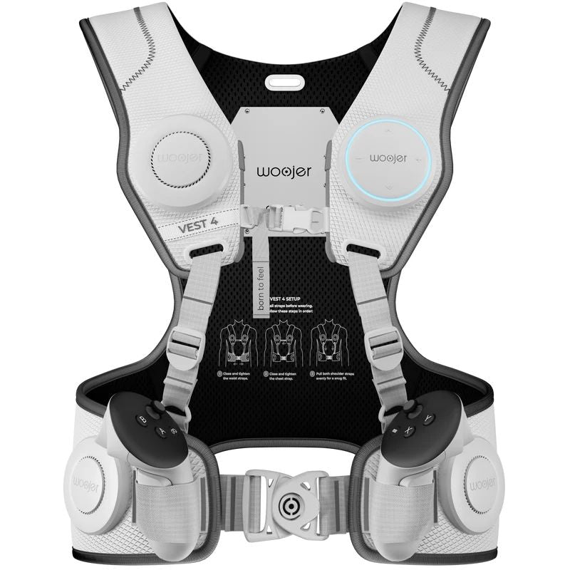 White Woojer Vest 4 haptic vest Made for Meta edition with VR controllers held at the waist, a VR haptic vest with six vibroacoustic haptic zones