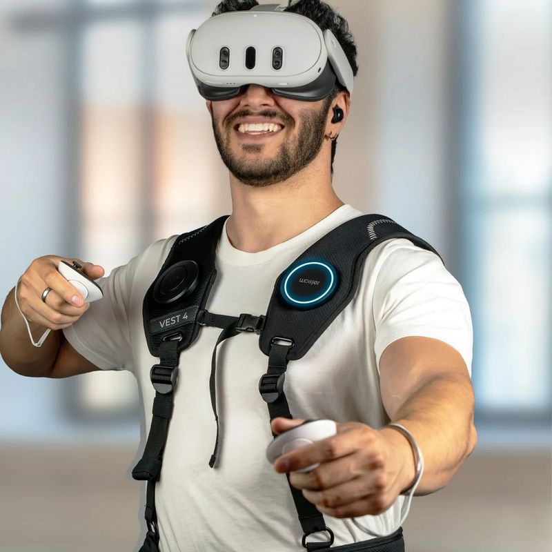 Player using a VR headset and controllers while wearing the Woojer Vest 4 haptic vest for immersive vibroacoustic VR play