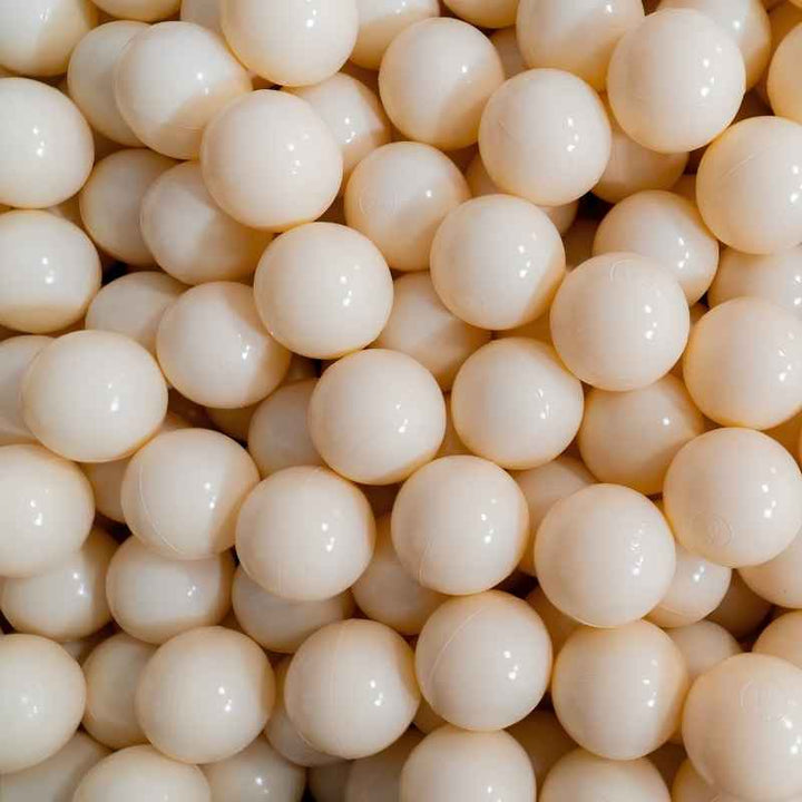 IGLU Ball Pit Balls 500pc in Light Beige, a close-up of 500 warm ivory-toned 7cm sensory play balls for calming ball pit play in sensory rooms and home playrooms