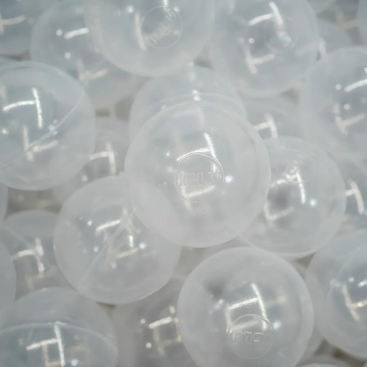 IGLU Ball Pit Balls 500pc in Transparent, a close-up of 500 clear 7cm ball pit balls suited for LED ball pools, light table play, and visual sensory stimulation environments