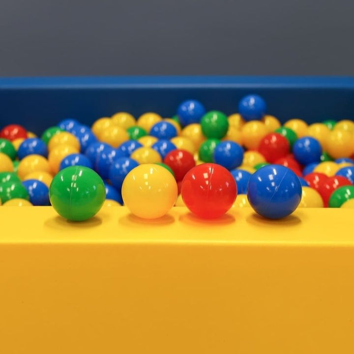 IGLU multicolour ball pit balls filling an IGLU Square Ball Pit, showing sensory play depth and colour variety for children