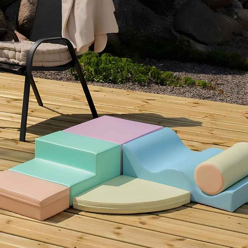 IGLU Explorer Soft Play Set in a pastel colourway, staged outdoors on a wooden deck