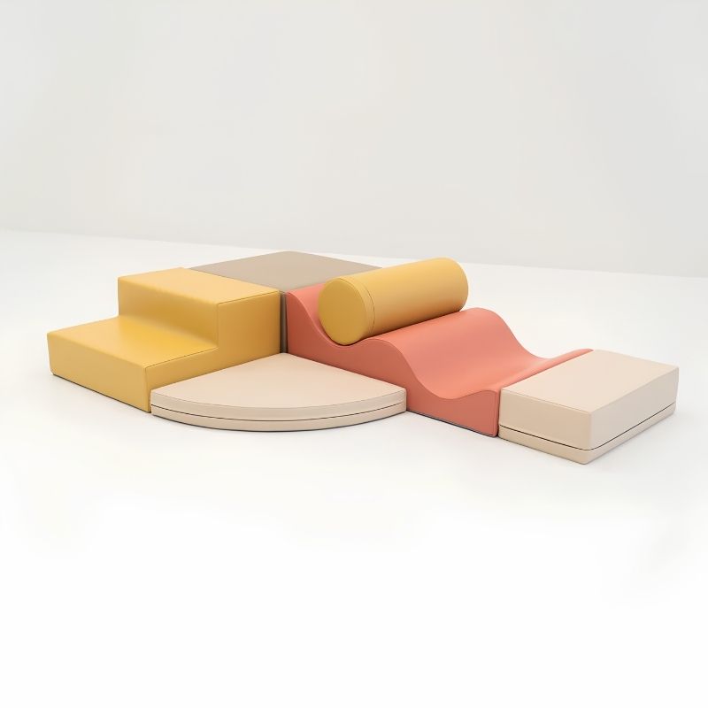 Rendered view of the IGLU Explorer Soft Play Set in a yellow and terracotta colourway, foam shapes arranged for toddler play