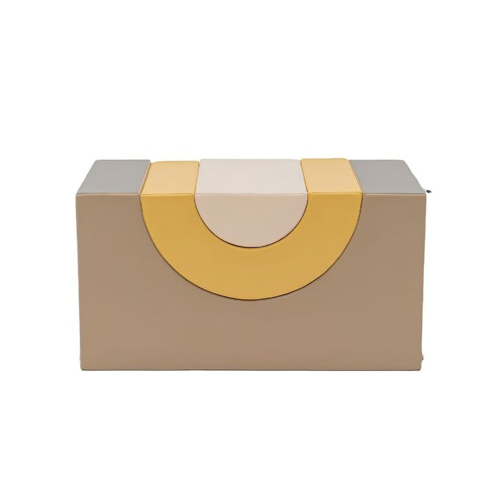 IGLU Rainbow Bridge Soft Play Set Beige/Honey variant in an alternate inverted stacking configuration, demonstrating how the three foam arch pieces can be reconfigured for varied modular soft play