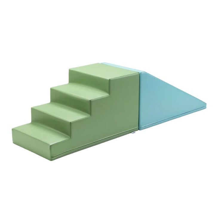 Foam stairs and ramp piece from the IGLU Soft Play Gym in green and teal, used for climbing and sliding