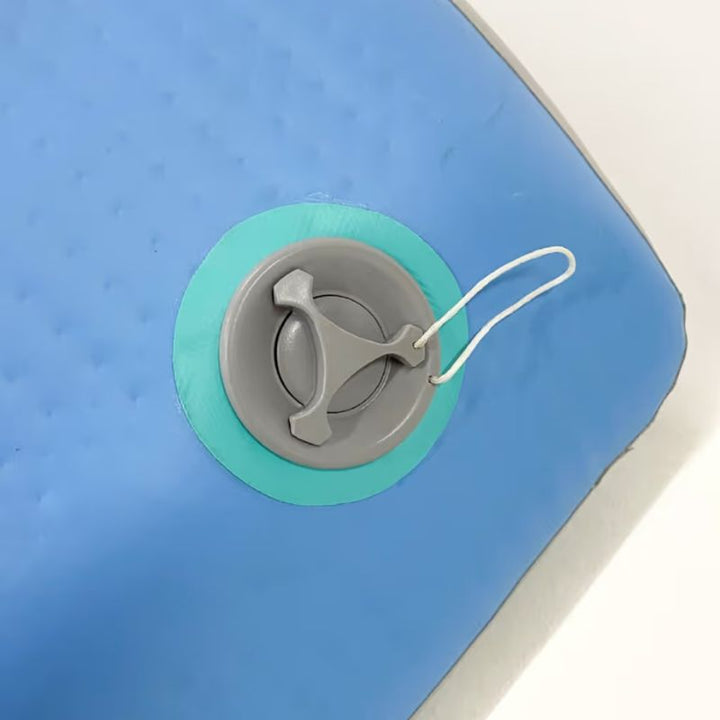 Close-up of the TFH Inflatable Body Rocker's inflation valve, showing the durable vinyl construction of this vestibular sensory toy
