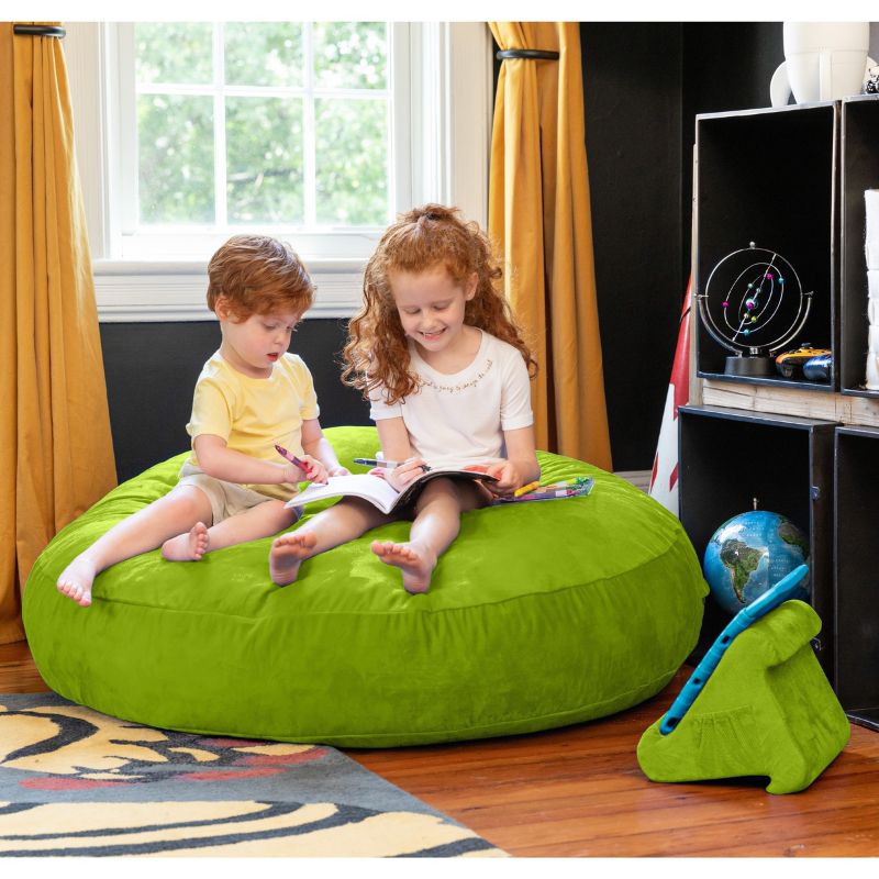 Two children reading together on a lime Jaxx Cocoon 4ft kids bean bag chair, a playful deep pressure seat