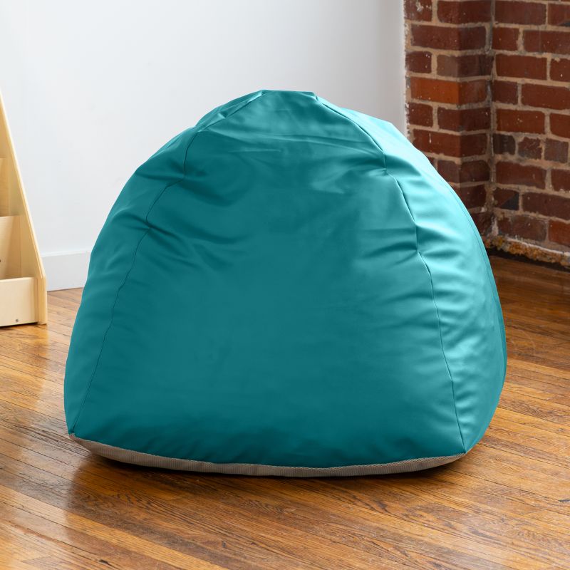 Empty teal Jaxx Gumdrop bean bag chair in a classroom reading corner