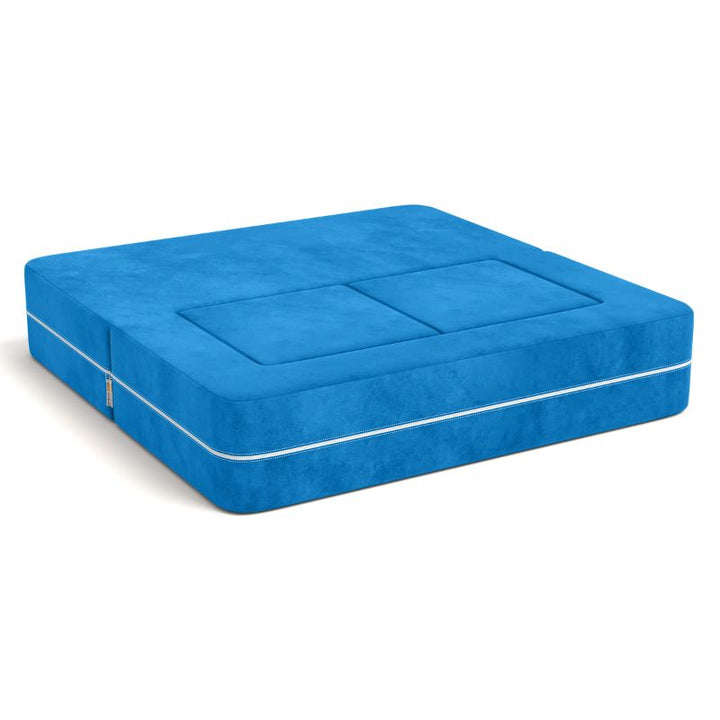Jaxx Zipline kids convertible loveseat in blue microsuede folded into bed mode, a 3-in-1 play sofa that becomes a kids bed