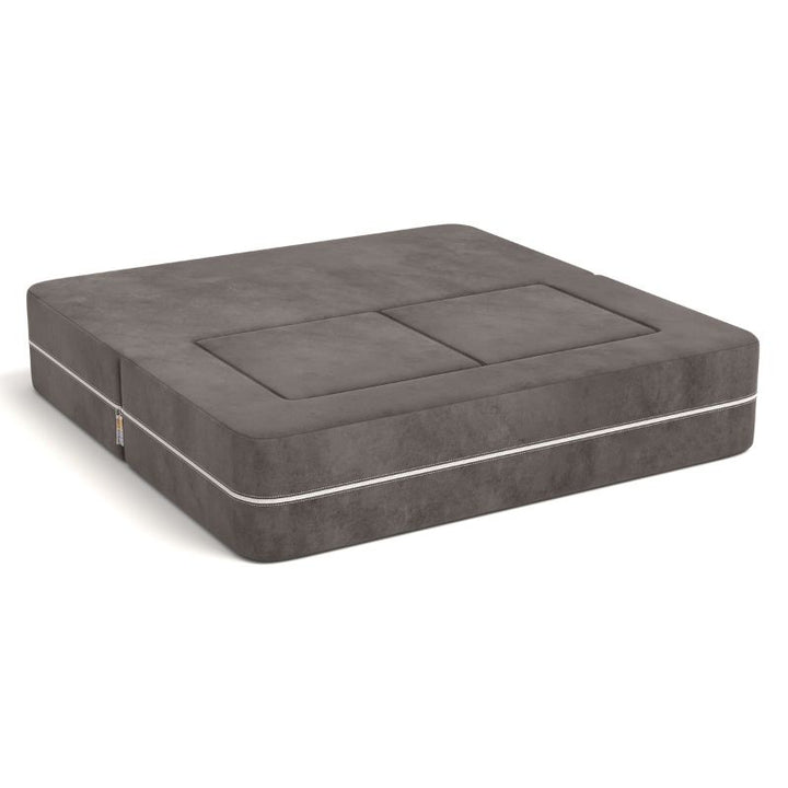 Jaxx Zipline kids convertible loveseat in charcoal microsuede folded into bed mode, a modular play sofa for sleepovers