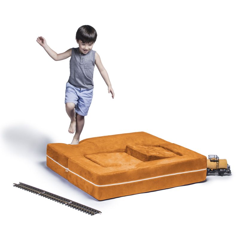 Jaxx Zipline kids convertible loveseat in orange microsuede in bed mode, a modular play sofa that folds flat for play