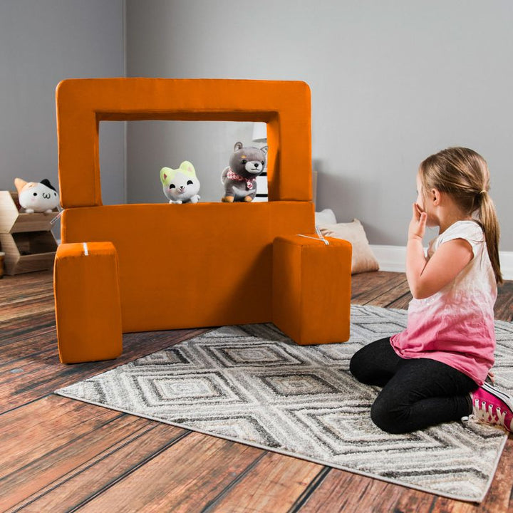 Jaxx Zipline kids convertible loveseat in orange microsuede built into a puppet theatre, a fold out play sofa for pretend play