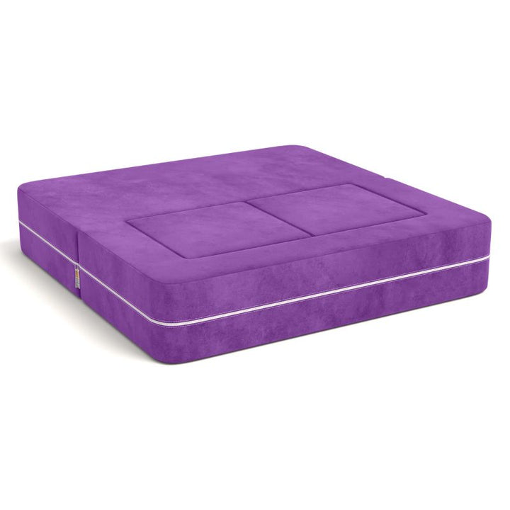 Jaxx Zipline kids convertible loveseat in purple microsuede folded into bed mode, a 3-in-1 play sofa that unfolds into a bed