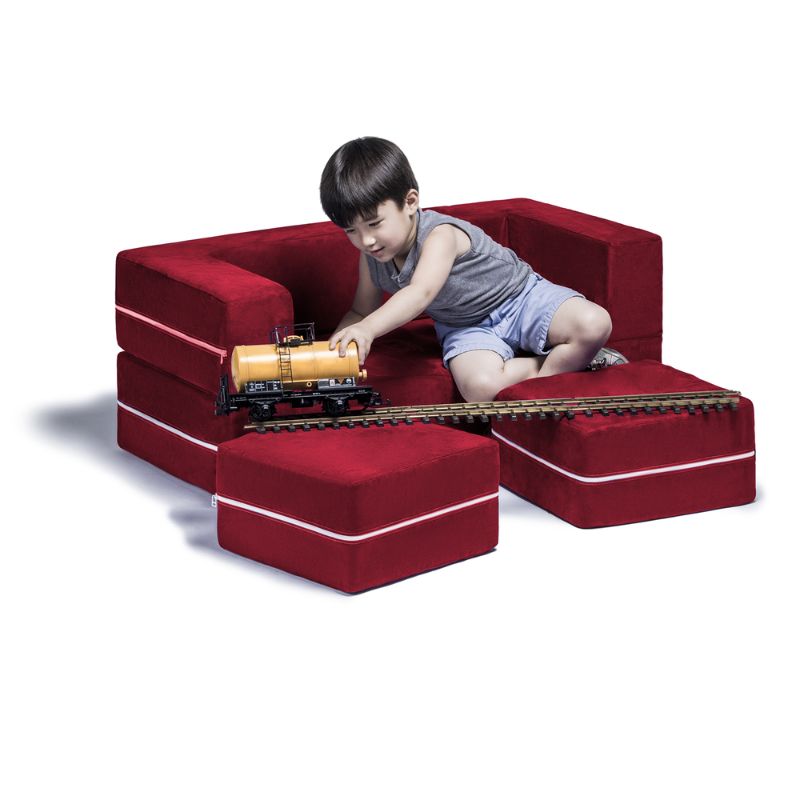 Jaxx Zipline kids convertible loveseat in red microsuede in use as seating, a fold out play sofa with ottomans
