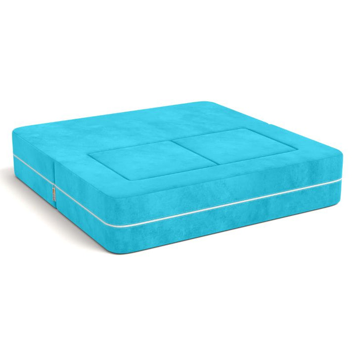 Jaxx Zipline kids convertible loveseat in teal microsuede folded into bed mode, a fold out play sofa that converts to a daybed