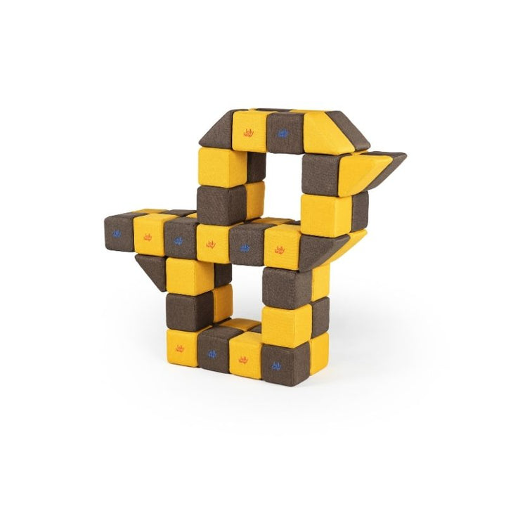 A second view of the angular sculptural structure built from JollyHeap Medium Set magnetic soft blocks