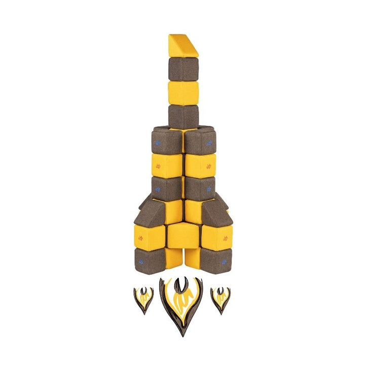 A tall rocket structure built from JollyHeap Medium Set magnetic soft blocks with flame-shaped triangle accents
