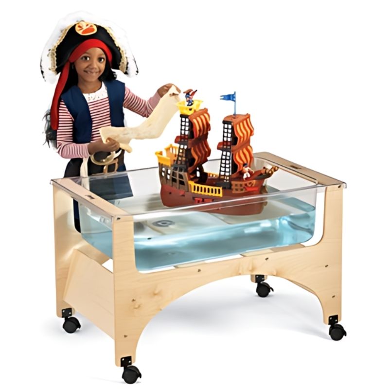 Child engaged in themed sensory play at the Jonti-Craft See Thru Sensory Table 24-1/2" High demonstrating the transparent acrylic tub in a classroom or therapy setting