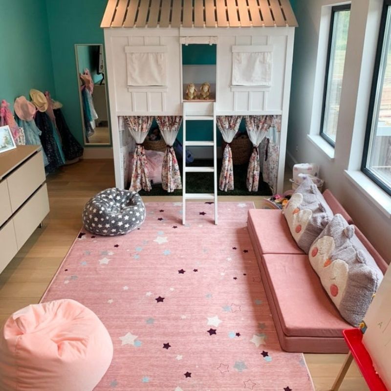 Top view of the Kiddie Couch in Blush Pink in a playroom, showing the modular kids play couch from above in a home setting