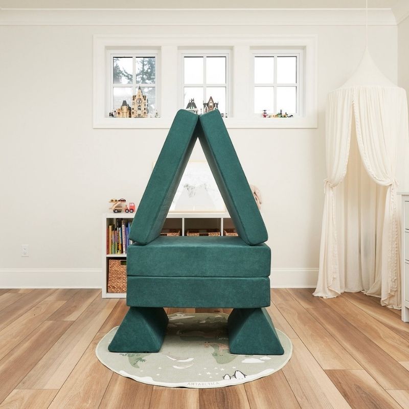 Kiddie Couch in Emerald Green built into a robot shape, showing imaginative creative play configurations with the modular foam couch