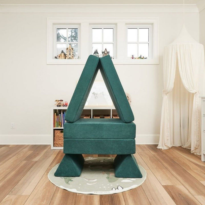 Kiddie Couch in Emerald Green built into a robot shape, showing imaginative creative play configurations with the modular foam couch