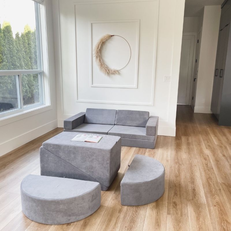 Kiddie Couch modular play couch in Koala Grey assembled as a couch in a family living room