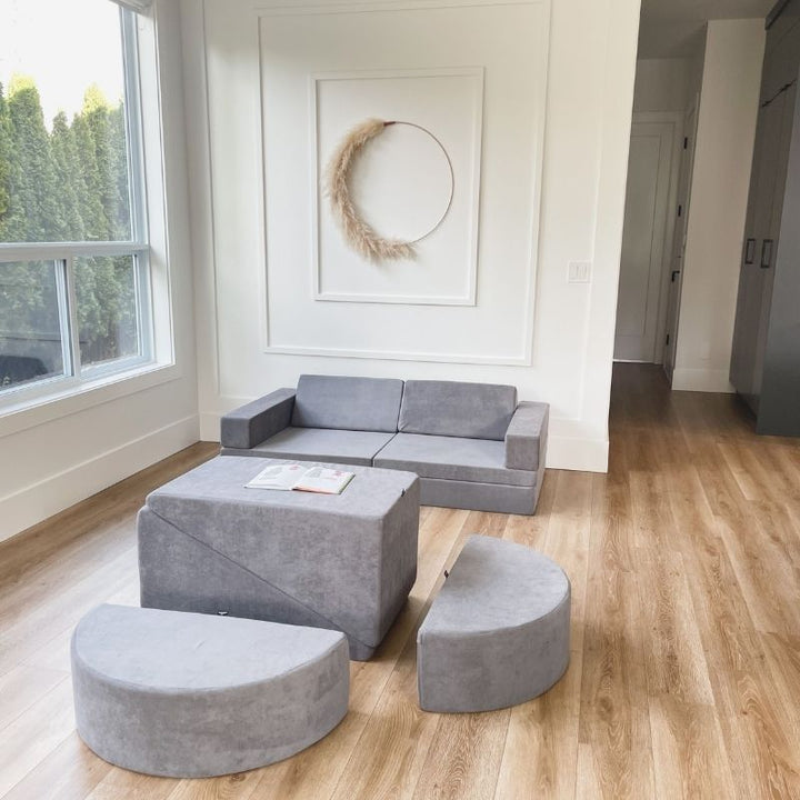 Kiddie Couch modular play couch in Koala Grey assembled as a couch in a family living room