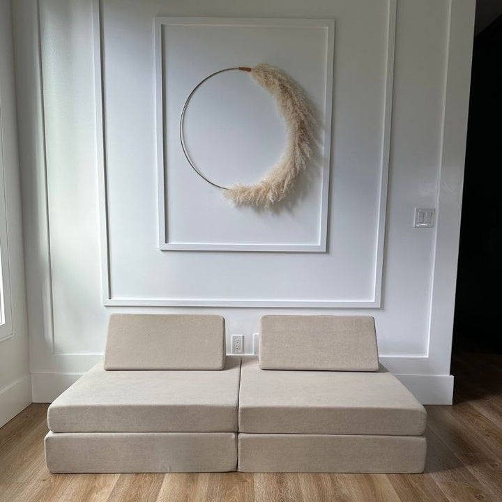 Front view of the Kiddie Couch modular play couch in Sand Beige showing the assembled four-piece configuration