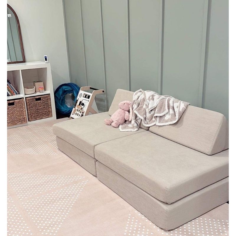 Top view of the Kiddie Couch in Sand Beige in a children's playroom showing the modular foam layout from above
