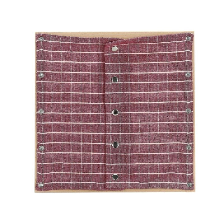 Kinderhuis Montessori dressing frame with red check textile panel, beechwood construction for fine motor skill development