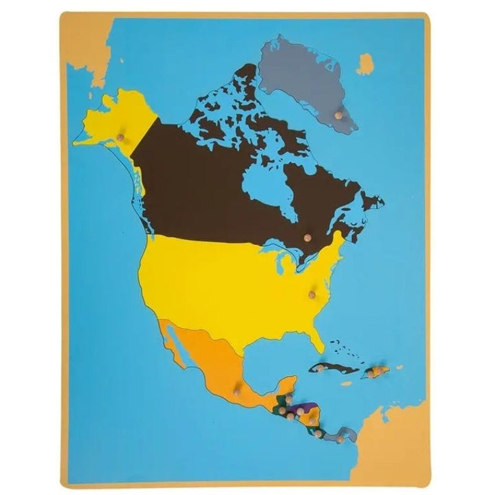 Kinderhuis Montessori Geography Cabinet showing the North America laser-cut puzzle map with capital-positioned wooden knobs