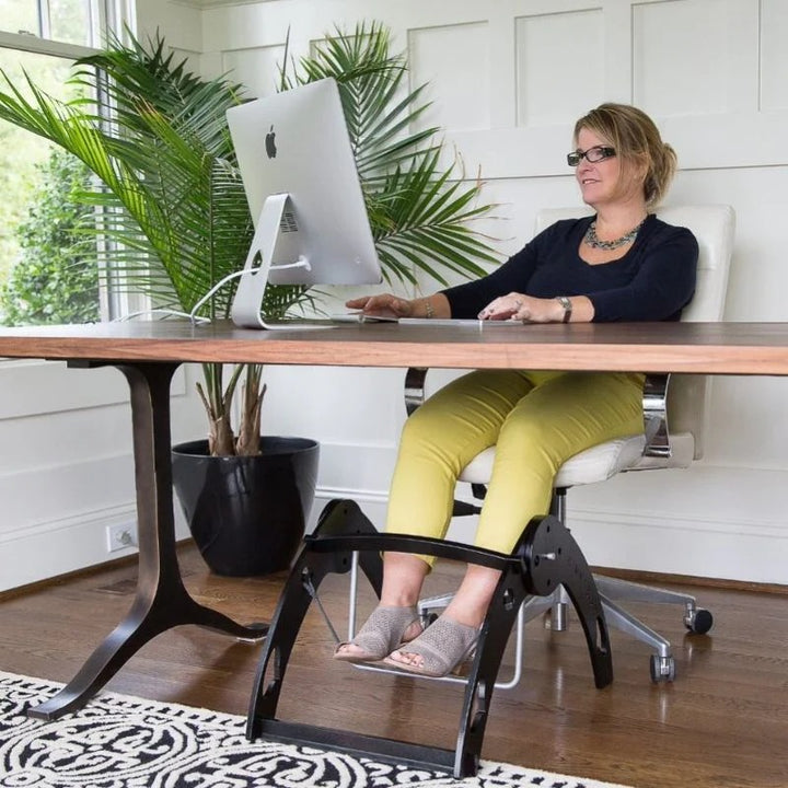 Kinnebar foot swing model lineup showing K200 and K300 options, a freestanding under-desk sensory and focus tool for children and adults