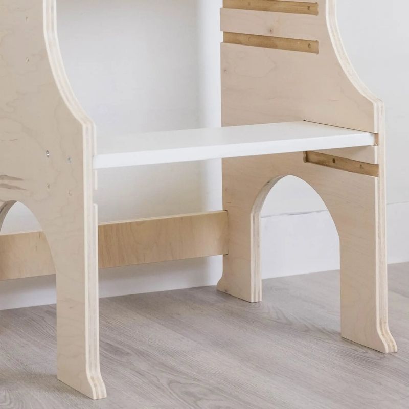 Sapiens Child Kiwi Kitchen Tower bottom close-up view showing the stable base construction, non-toxic eco-friendly wood finish, and non-balancing design of the Vancouver-made learning stool