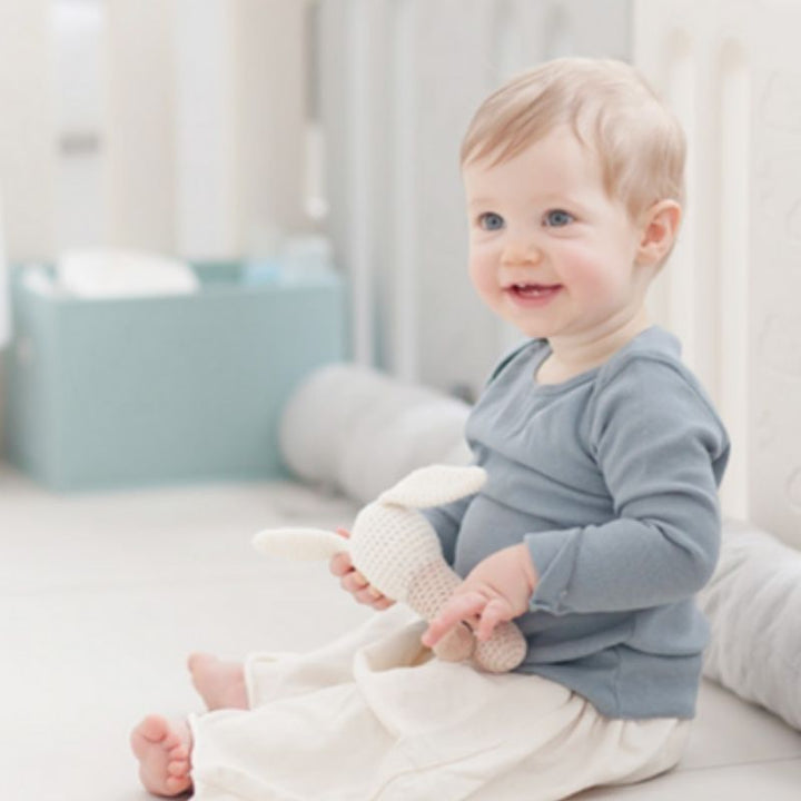 Licoco non-toxic baby playmat inside Ggumbi play yard, showing a cushioned tummy time and crawling surface for infants