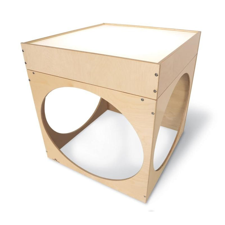 Whitney Brothers Superbright LED Creative Cube with its LED light table switched on, a birch plywood light table reading cube for preschools, daycares and home
