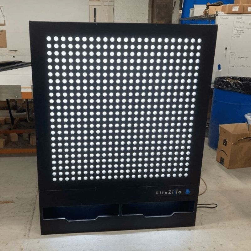 LiteZilla Giant Lite Brite front view with lights off, showing the black HDPE frame and LitePin grid structure