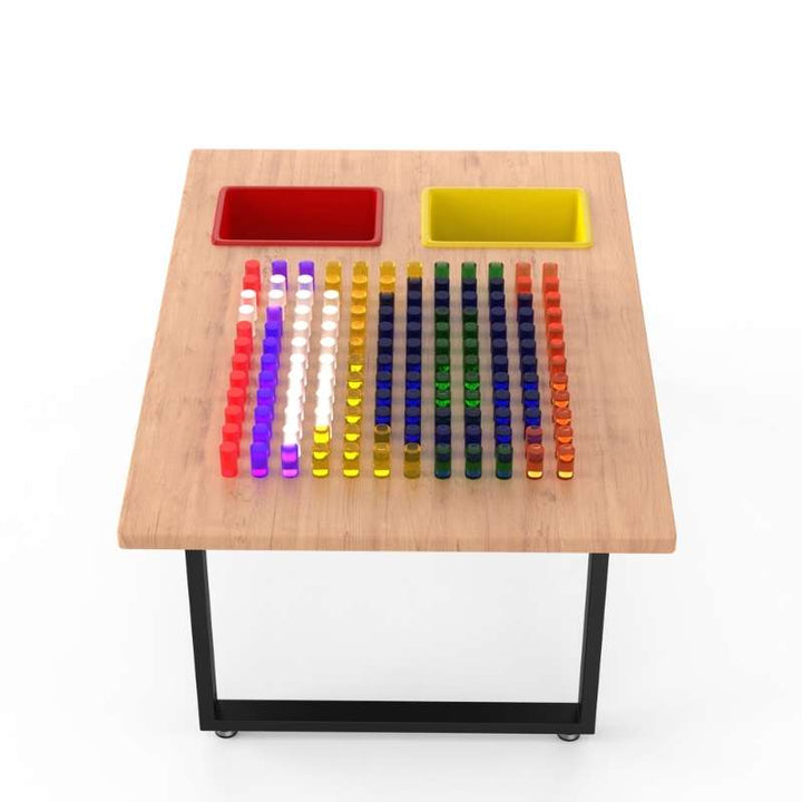 LiteZilla IllumiTable in Maple Veneer finish with the LitePin grid glowing in rainbow colours, an interactive LED sensory light table for classrooms and homes