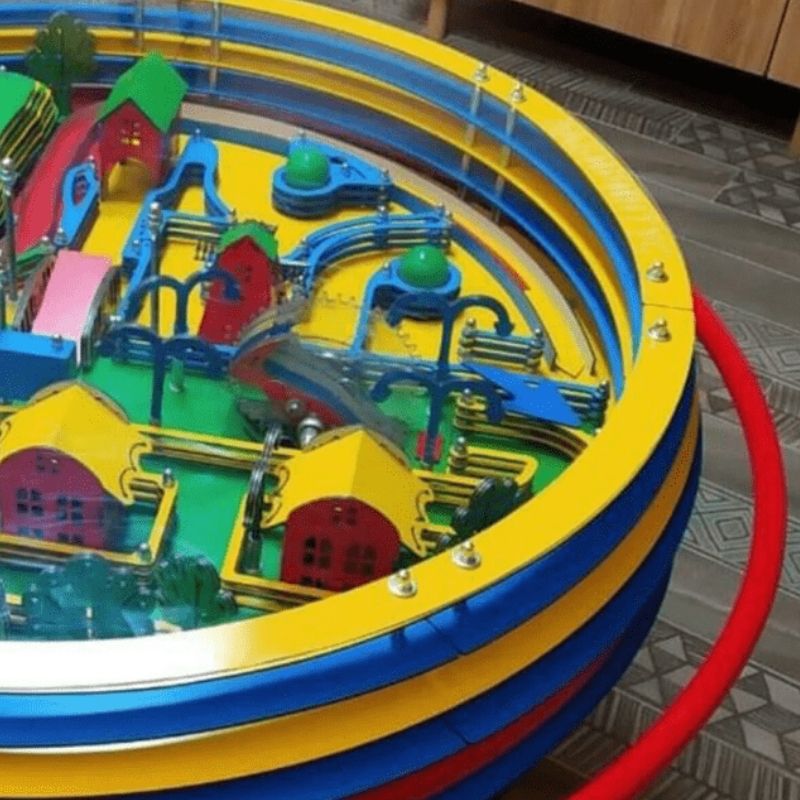 LiteZilla Twistopia Tabletop Labyrinth side view showing the compact freestanding pedestal design and circular tilting board, ideal for classrooms, museums, and interactive sensory exhibits
