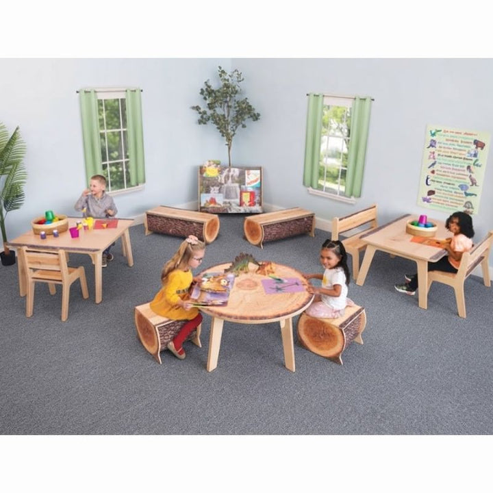 Children playing at Whitney Brothers Nature View Live Edge Square Tables and a round table in an inclusive classroom furnished with biophilic seating