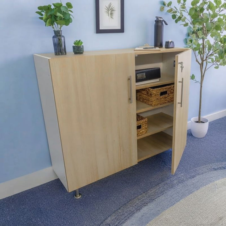 Whitney Brothers elevatED Lockable Wall Cabinet with one door open, holding baskets and supplies on adjustable shelves, a lockable storage cabinet for classrooms and homes