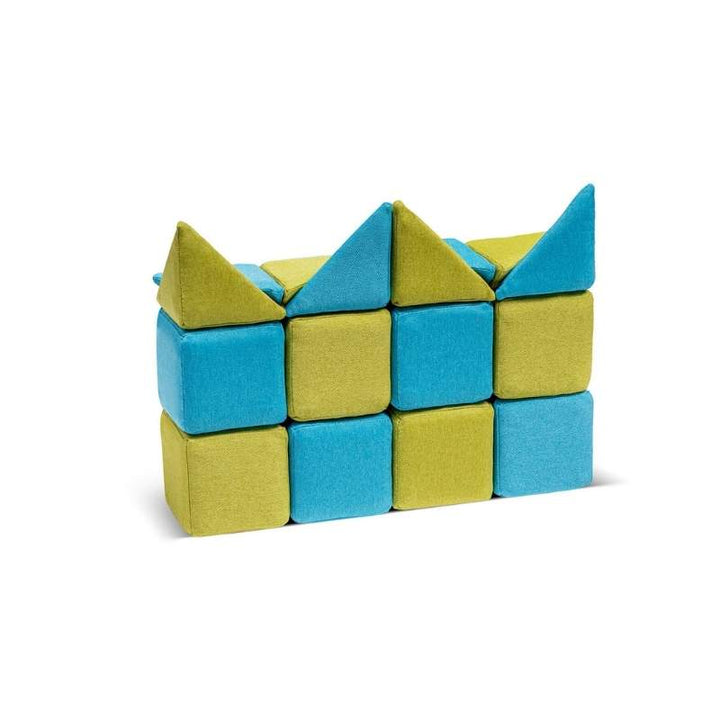 JollyHeap Extra 16 magnetic block expansion set built into a small wall structure, combining the new wedge and pyramid shapes with standard cubes for sensory building play