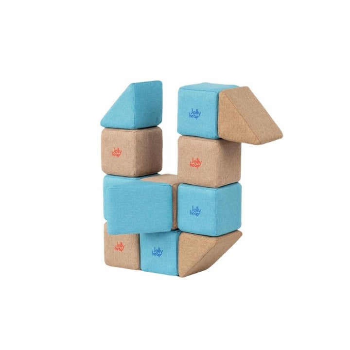 JollyHeap Pixi magnetic building blocks stacked into an angular tower with triangle accents